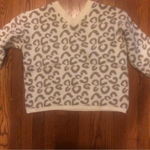White and tan print sweater